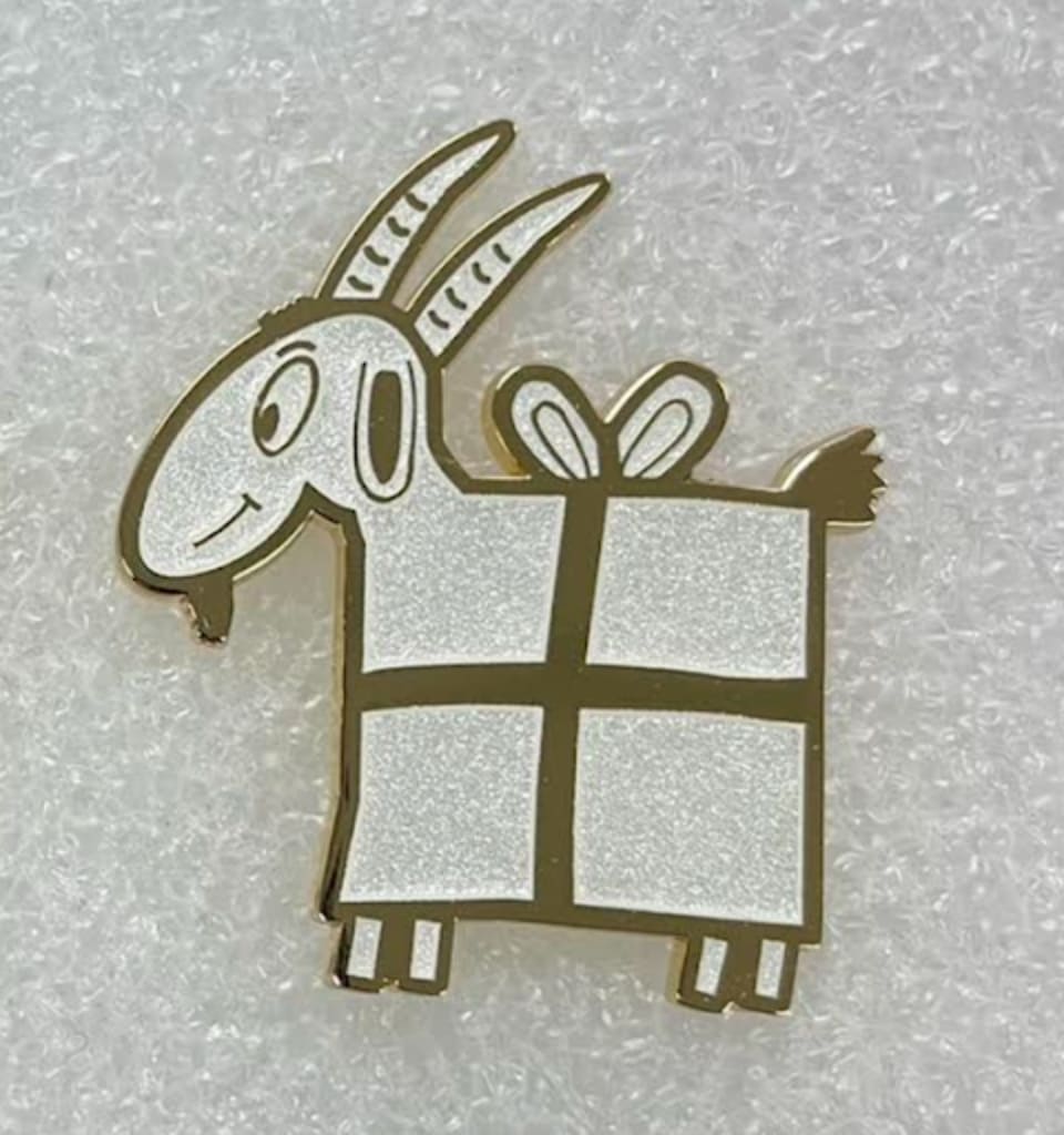 The pin is composed of zinc alloy and coated with different colors. No actual gold present.