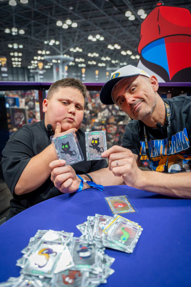 GaryVee and The Rizzler opening Topps VeeFriends Chrome cards at Fanatics Fest.