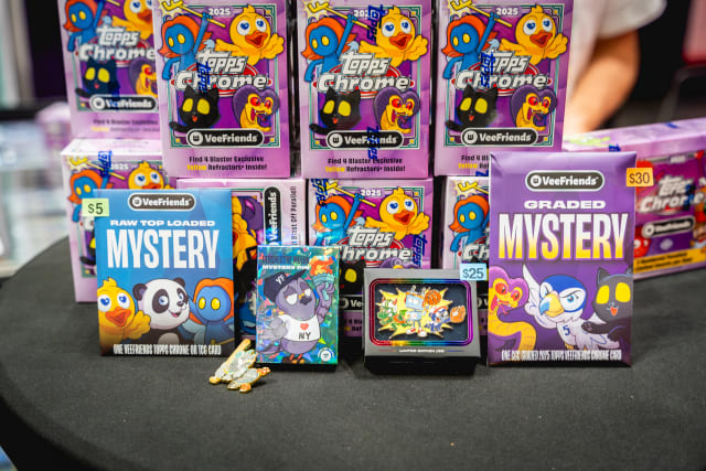 Fanatics Fest Exclusive products, including pins, Topps VeeFriends Chrome cards, and break mats, released at Fanatics Fest NYC 2025.