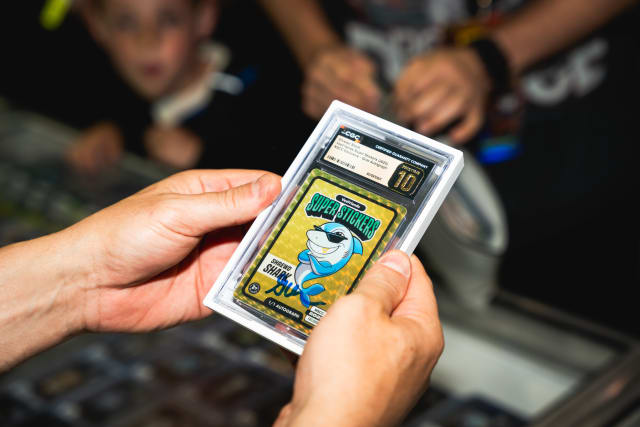 The 1/1 Gold Autograph Shrewd Shark Super Sticker, pulled live at NSCC and graded a Pristine 10 by CGC.