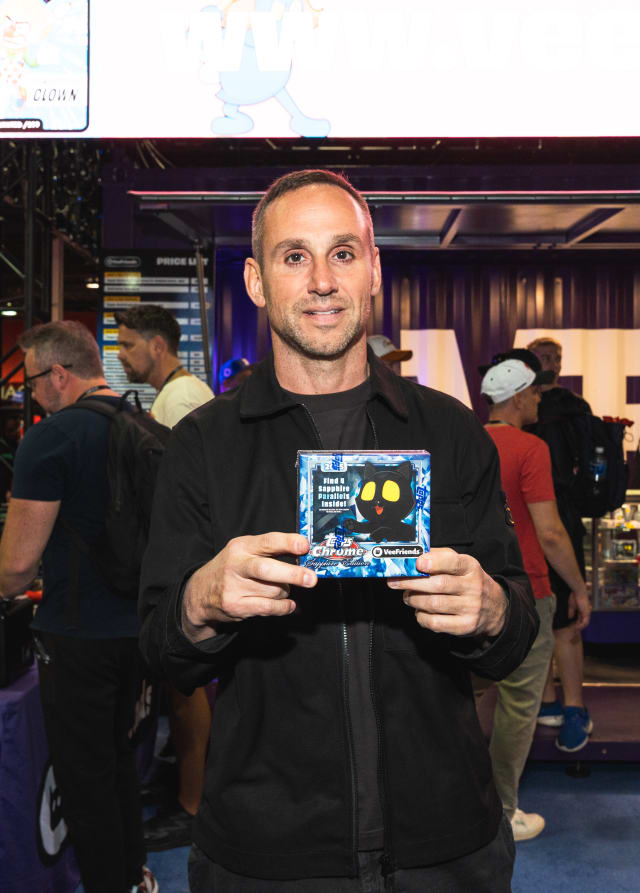 CEO of Fanatics, Michael Rubin with Topps VeeFriends Chrome Sapphire Edition at NSCC 2025. During the event, attendees had an opportunity to score a box of Sapphire 75% below market price.