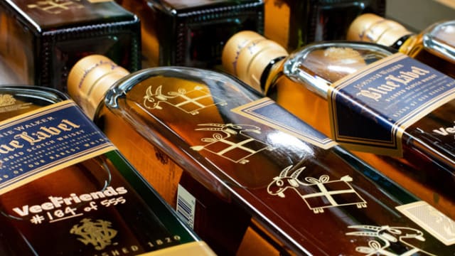 In Gift #5, VeeFriends teamed up with Johnnie Walker to gift the goats exclusive bottles of Johnnie Walker Blue Label, all serialized out of 555.